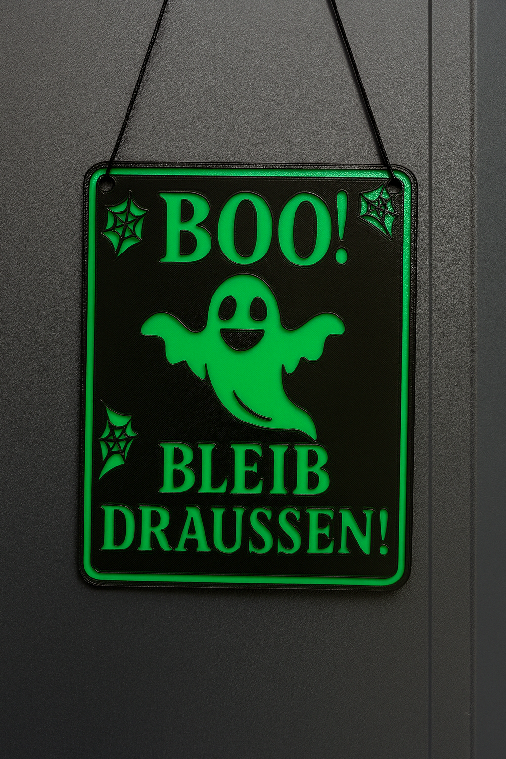 Boo bleib draussen Schild bestellen mit grün leuchtendem Geist und Spinnennetz Design von Wupperlike