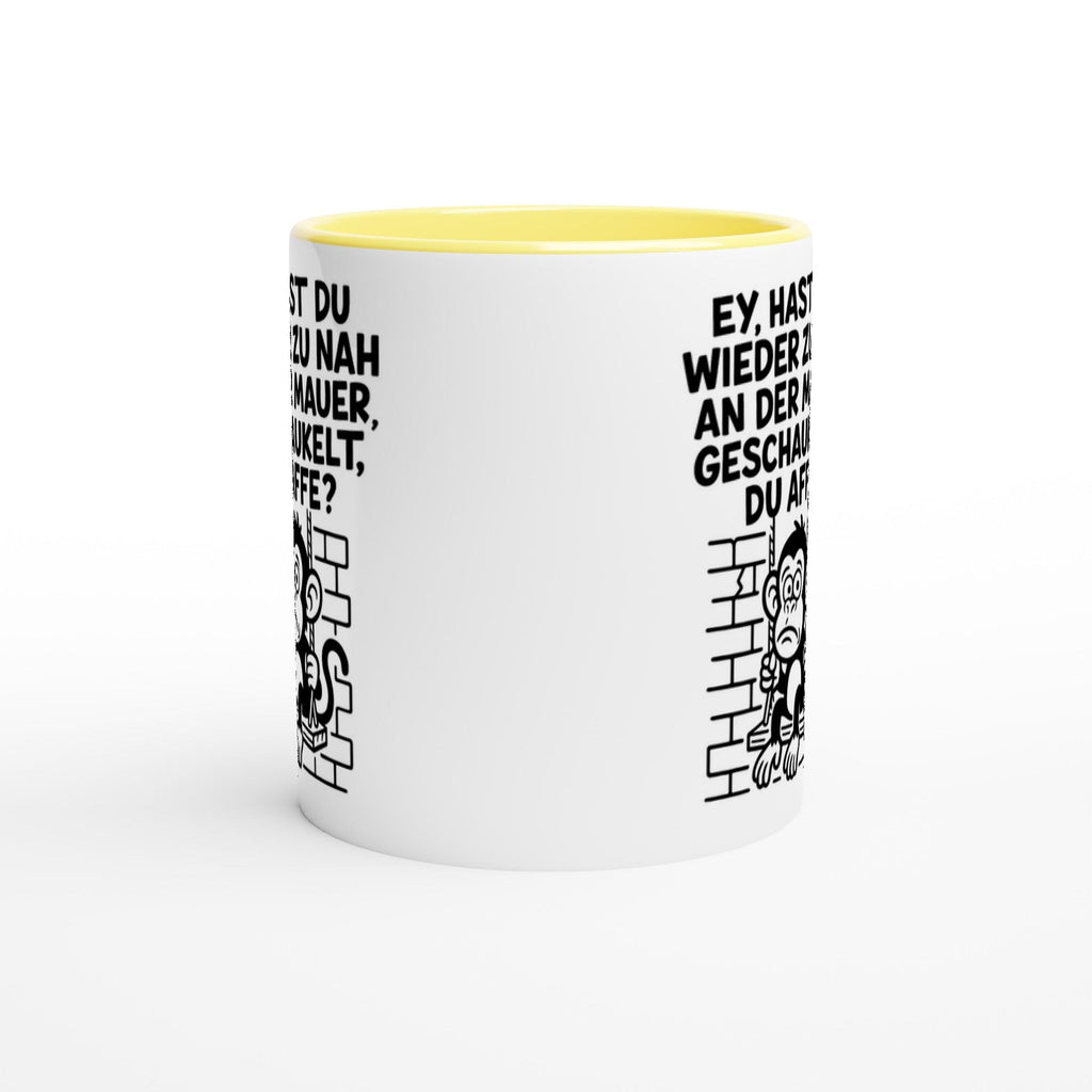 Weiße Tasse mit gelbem Innenraum und witzigem Affen-Motiv als witzige Geschenkidee für Freunde