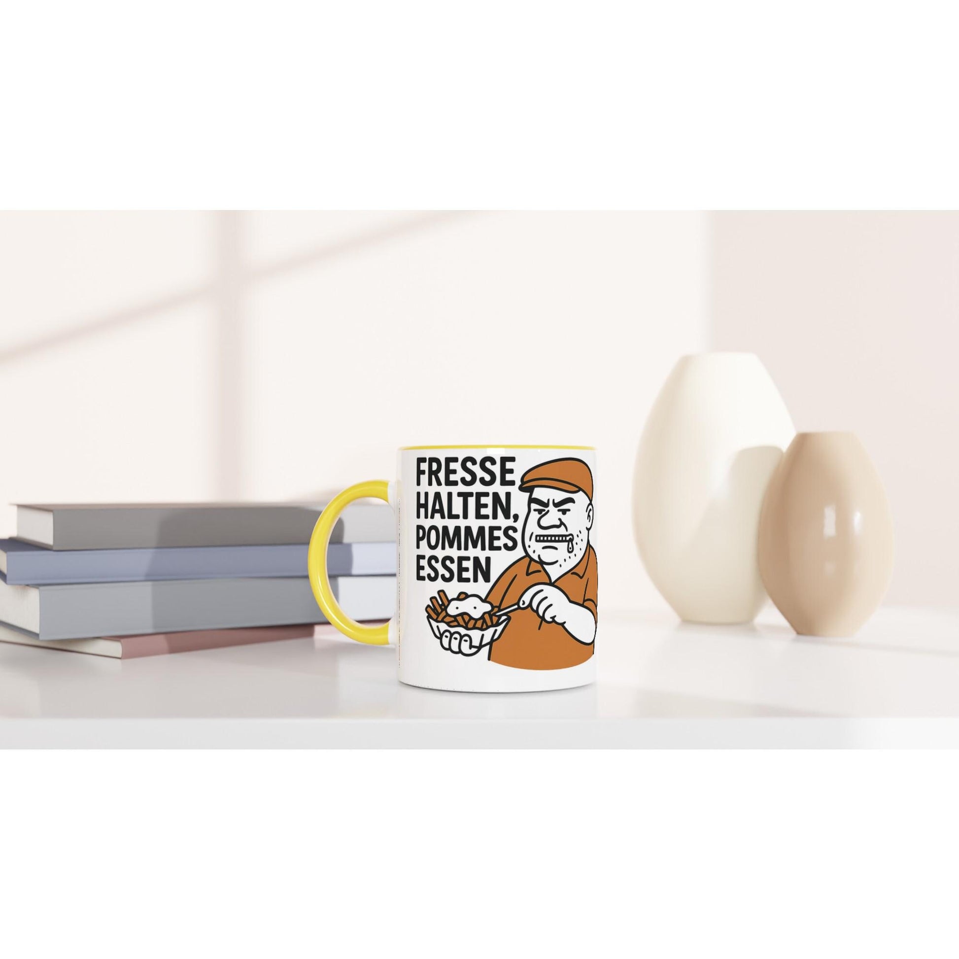 Kaffeetasse mit gelbem Henkel und Aufschrift Fresse halten Pommes essen Geschenkidee Ruhrgebiet
